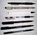 Various ink pens for sketching and drawing in pen and ink.